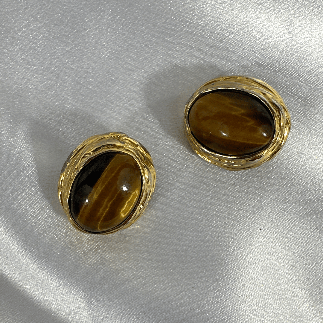 CINER Tiger Eye Clip on Earrings, on satin background