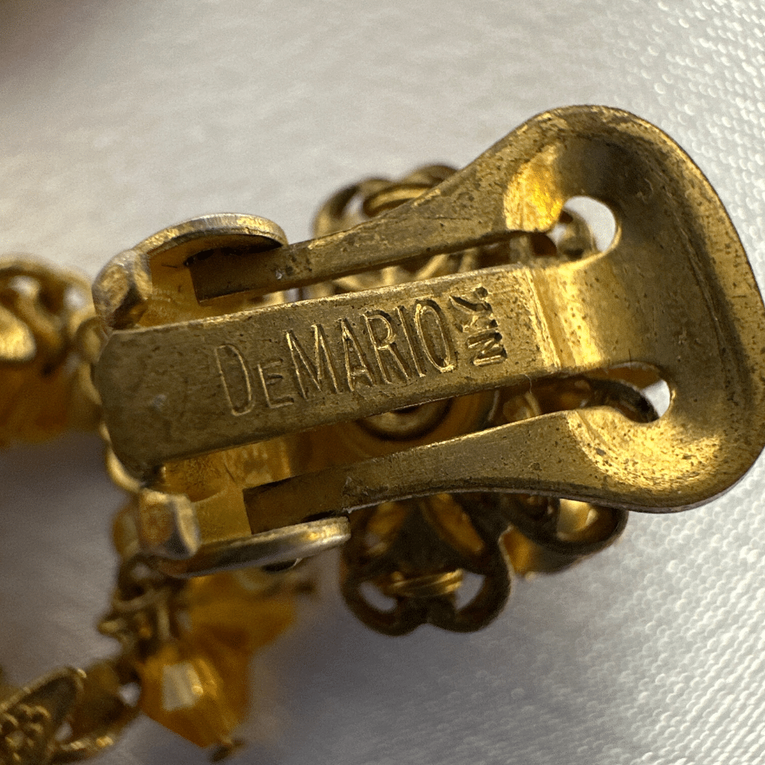 Demario Champagne Lucite Earrings - clasp detail - on satin background
