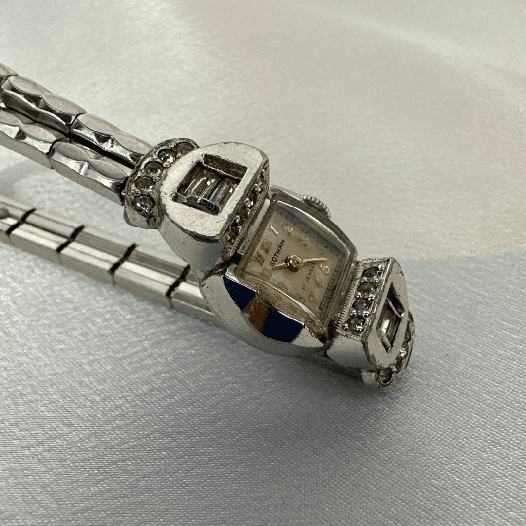 Gotham Stretch Band Watch with 17 Rhinestones - dial detail on satin