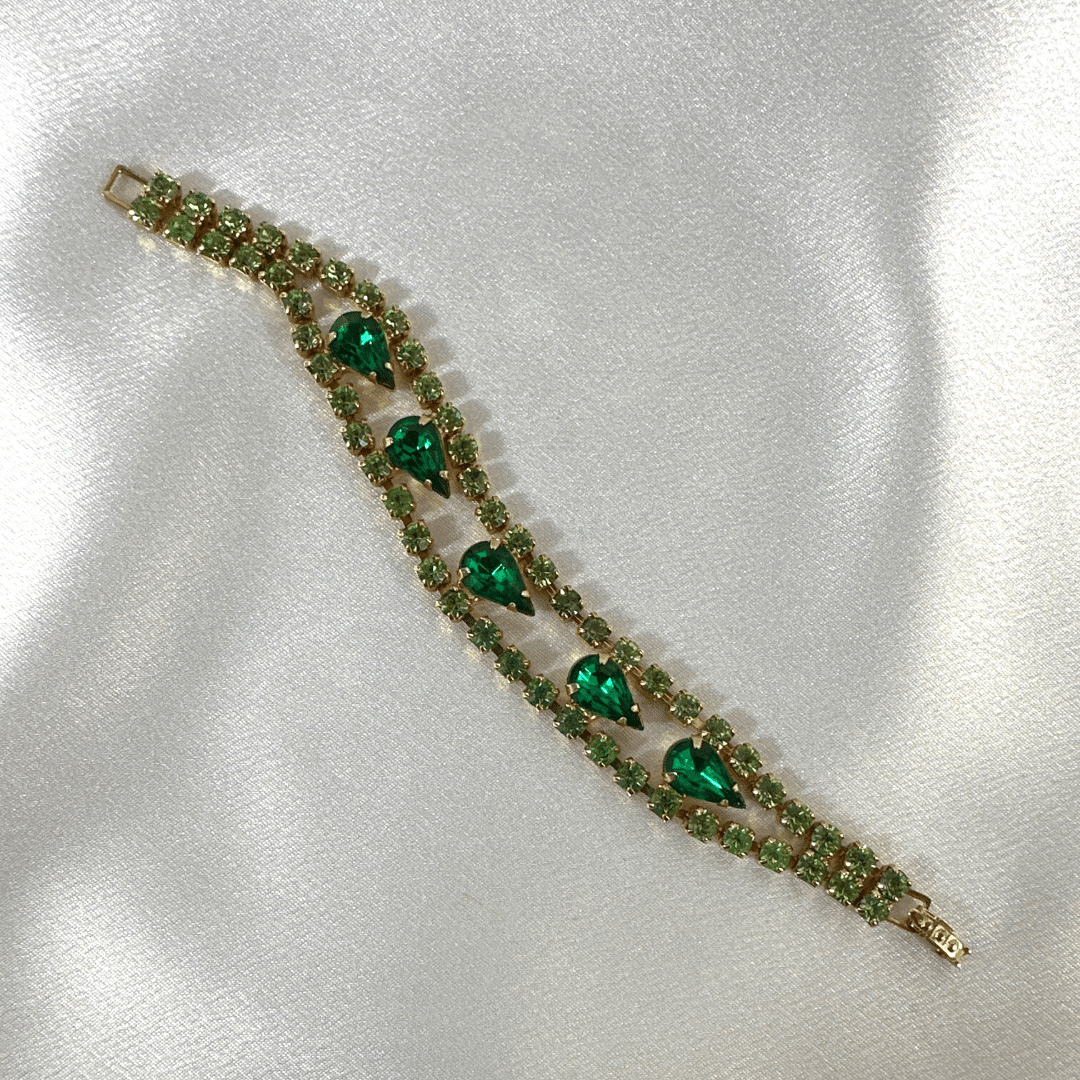 Green Glass and Rhinestone Vintage Bracelet - satin background