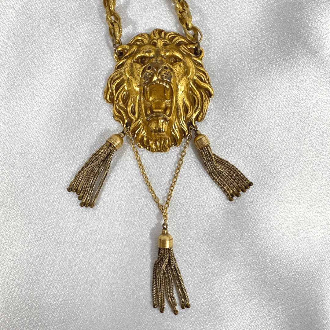 Miriam Haskell  Lion Head Pendant Necklace - satin background
