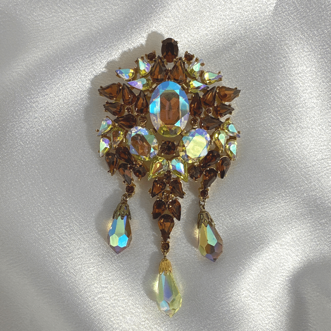Trifari Gold-tone Brooch - Satin Background