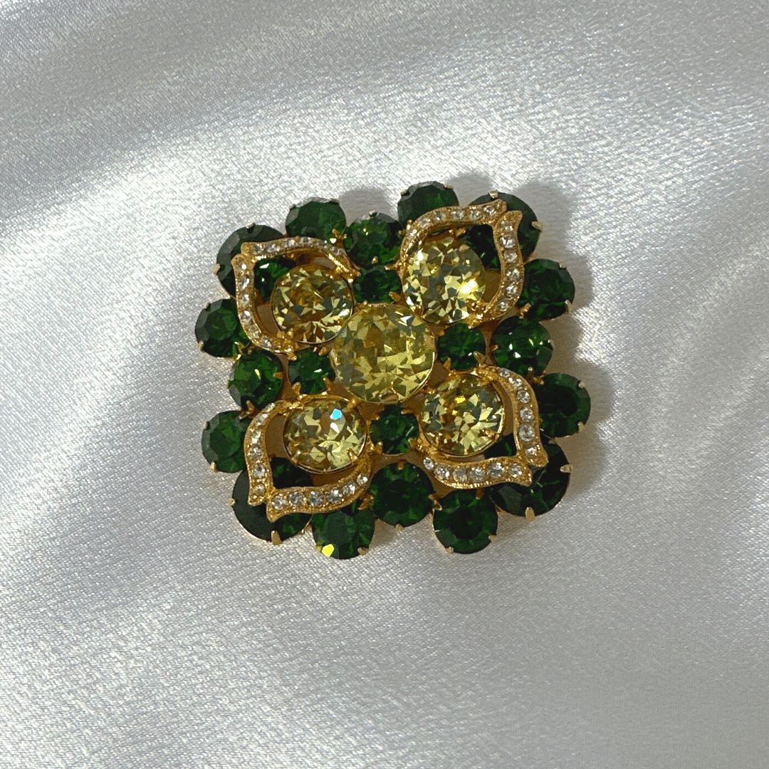 Vintage Eisenberg Brooch - Enchanting Green & Gold Glass - Satin Background