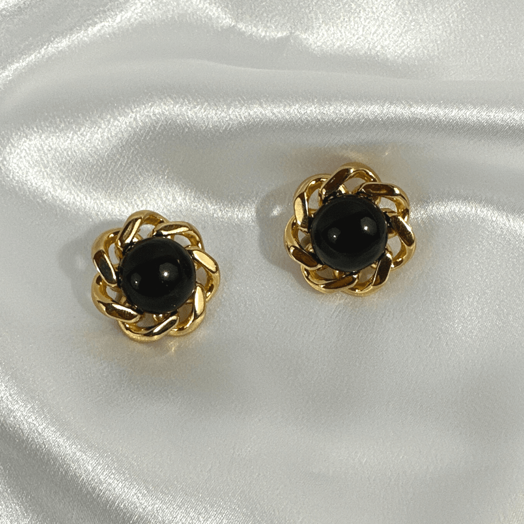 Vintage Signed Ciner Black Cabochon Glass Flower Shape Earring - Satin Background