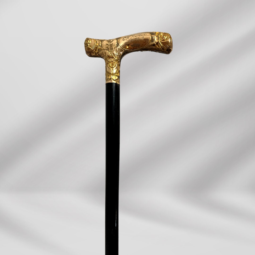 Antique 1860 Walking Stick. Black Cane with Carved Gold-Plated Knob Handle, Signed Skinner.