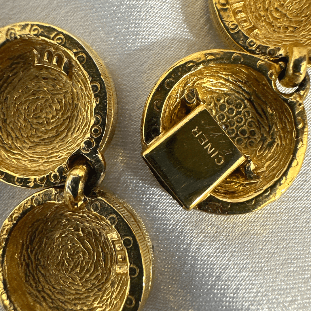CINER Enamel Link Necklace on Satin Background, Signature