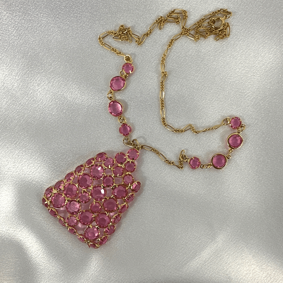 Pink Geometric Pendant on Gold Chain - relaxed view