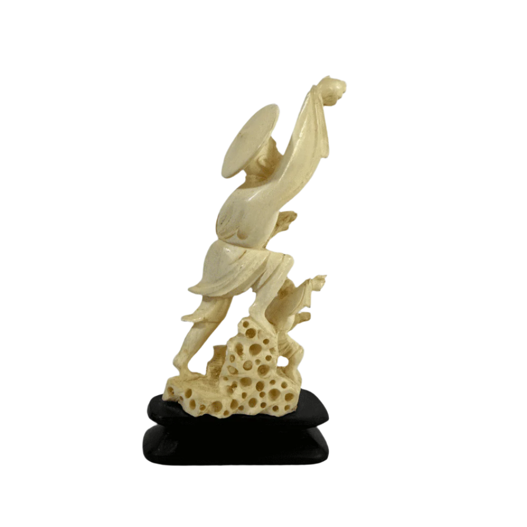 Vintage Chinese carved ivory statue depicting two men in traditional dress, finely detailed with a wide-brimmed hat and flowing robes.