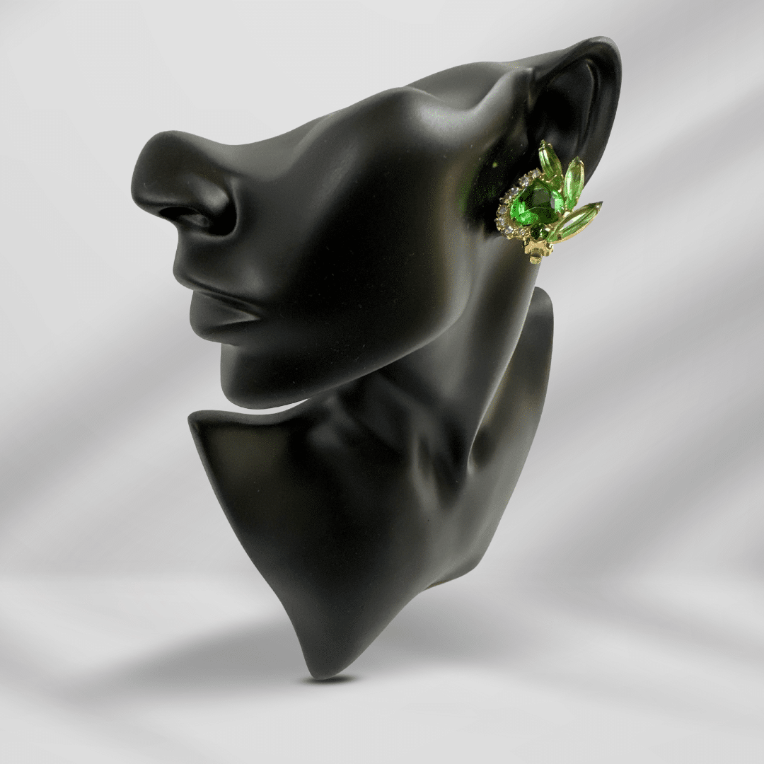Vintage Unsigned Julianna Green Heart Cut Glass and Rhinestone Earrings - mannequin with single earring