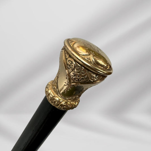 Antique Walking Stick. Elegant Black Cane with Gold-Plated Knob Handle, Signed Skinner Halifax.